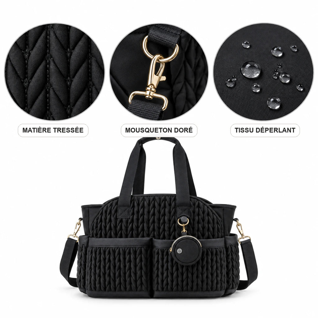 Détails du cabas à langer tressé noir : matière, mousqueton doré et tissu déperlant | NOLIERA