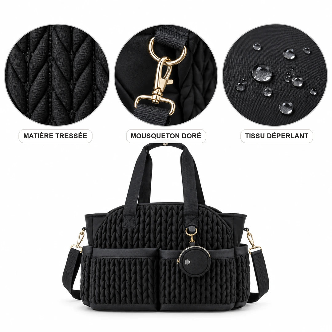 Détails du cabas à langer tressé noir : matière, mousqueton doré et tissu déperlant | NOLIERA
