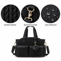 Détails du cabas à langer tressé noir : matière, mousqueton doré et tissu déperlant | NOLIERA