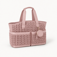Cabas à langer tressé rose, vue studio fond blanc | NOLIERA