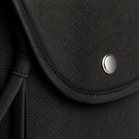 Détail du bouton pression de la pochette à couches | NOLIERA