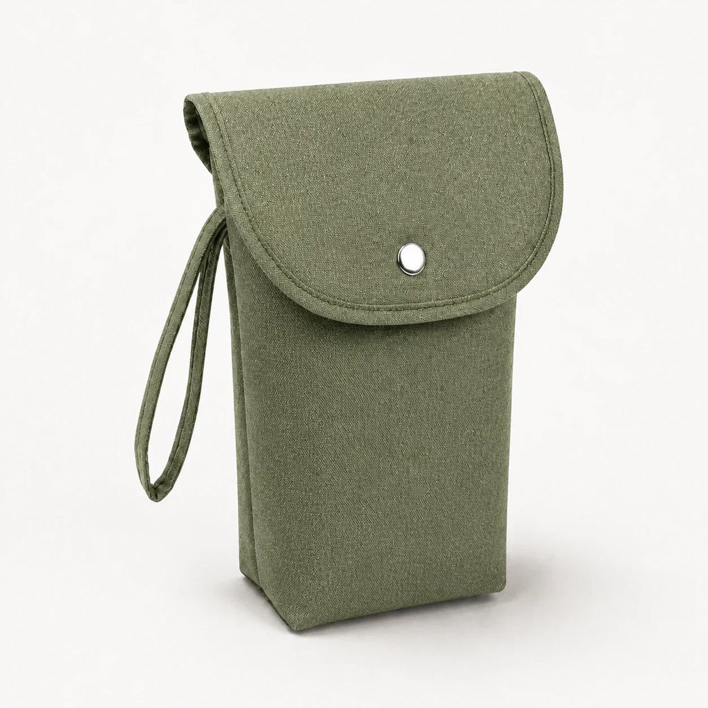Pochette à couches verte, vue studio fond blanc | NOLIERA