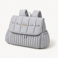 Sac à dos à langer tressé gris en polyester déperlant, vue studio fond blanc | NOLIERA