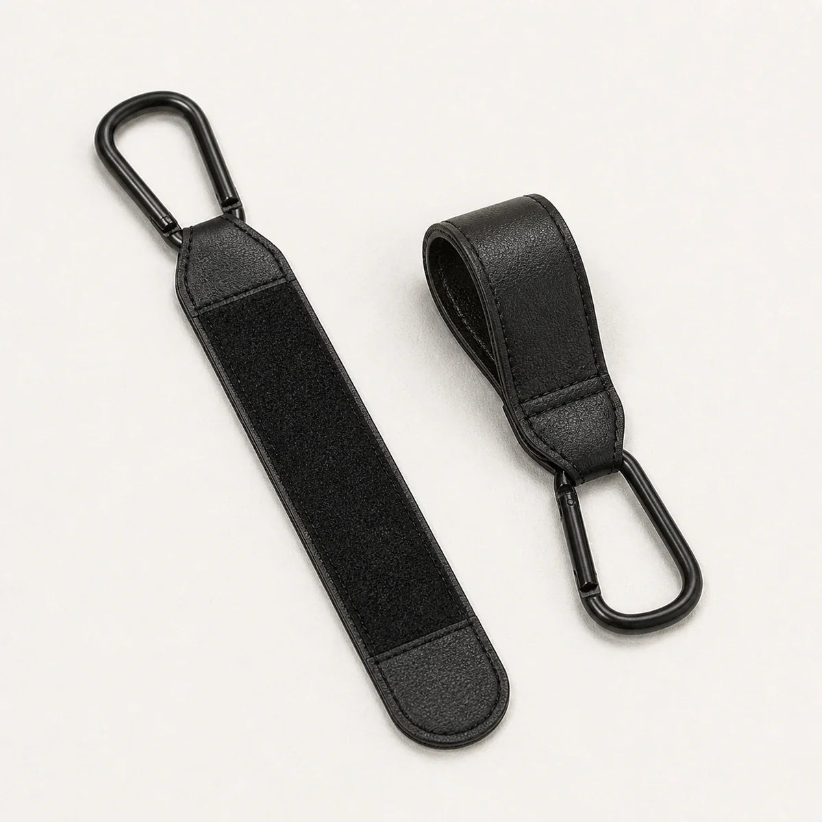 Paire de crochets de poussette noirs, vue packshot | NOLIERA