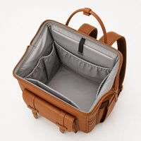 Intérieur du sac à dos à langer cuir camel ouvert | NOLIERA