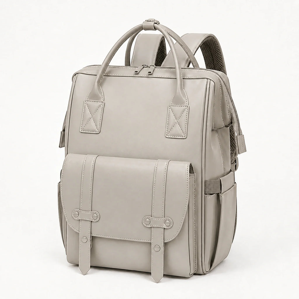 Sac à dos à langer cuir gris pierre, vue studio | NOLIERA