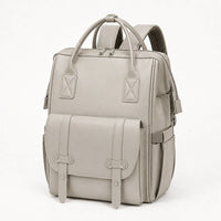 Sac à dos à langer cuir gris pierre, vue studio | NOLIERA