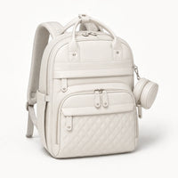 Sac à dos à langer blanc effet cuir, vue studio | NOLIERA