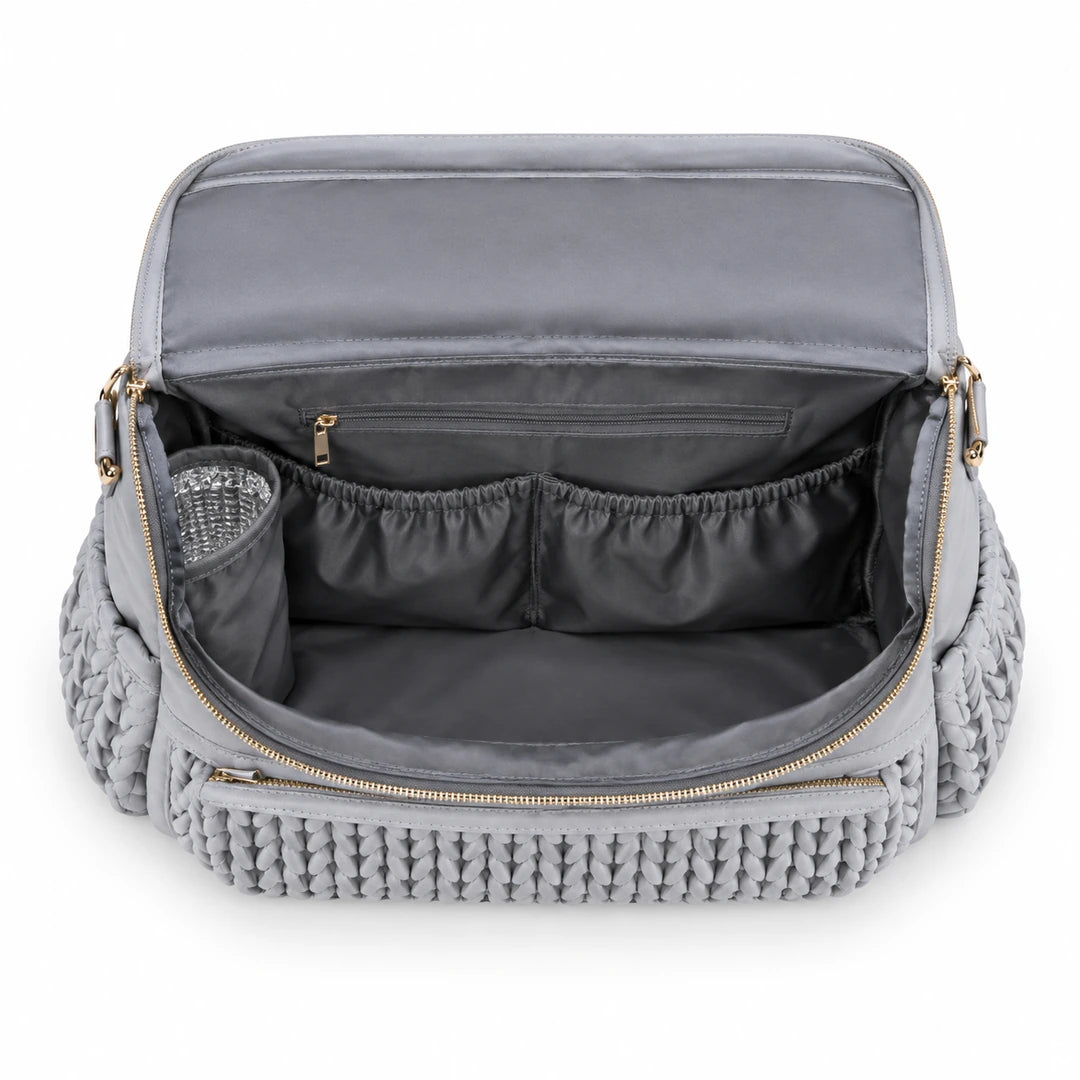 Intérieur vide du sac à dos à langer tressé gris avec poches de rangement | NOLIERA